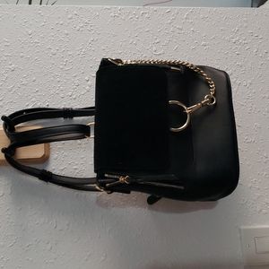 Moda Luxe black and gold backpack/purse